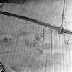 Brunstane, oblique aerial view, taken from the NE, centred on cropmarks, possibly of coal pits.
