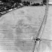 Brunstane, oblique aerial view, taken from the NW, centred on cropmarks, possibly of coal pits.