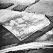 Eastfield, Inveresk: oblique air photograph of pit-alignment, enclosure, cultivation remains and cropmarks