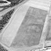 Oblique aerial view centred on the cropmarks of the pit-alignment and palisaded settlement, taken from the SW.