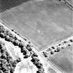 South Lodge, oblique aerial view, taken from the W, centred on a series of cropmarks which include a possible enclosure.