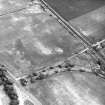 South Lodge and Prestongrange Crossing, oblique aerial view, taken from the W, centred on cropmarks including those of enclosures and pits.