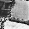 Philip Haugh, oblique aerial view, taken from the NW, centred on cropmarks of a settlement.