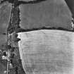 Middlestead, oblique aerial view, taken from the ESE, centred on the cropmarks of an enclosure.