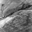 Fairneylees, oblique aerial view, taken from the ENE, centred on the cropmark of a scooped settlement.