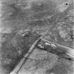 Headshaw, oblique aerial view, taken from the SE, centred on the cropmarks of a fort.