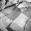 Newstead, Roman fort and temporary camps: air photograph showing fort (NT 569 344), Southern annexe (NT 569 341), Eastern annexe (NT 572 343), annexe (NT 571 343), possible annexe (NT 570 346) and 'Great camp' complex of temporary camps (NT 574 341). Also shows enclosure at Broomhill (NT 5734 3422)
