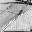 Newstead, oblique aerial view, taken from the SW, centred on the southern annexe. The Newstead by-pass (under construction) runs across the photograph.