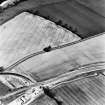 Newstead, oblique aerial view, taken from the SW, centred on the Roman fort and the western and southern annexes. The Newstead by-pass (under construction) is visible in the bottom half of the photograph.
