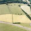 Newstead, oblique aerial view, taken from the S, centred on the Roman fort eastern annexe and 'great camps' complex.