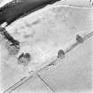 Newstead, oblique aerial view, taken from the SW, centred on the site of a possible Roman Amphitheatre and the trial excavation.