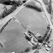 Oblique aerial view centred on the cropmarks of the SE of a Roman temporary camp with the western ditch and corner of Ravenswood temporary camp and linear cropmarks adjacent, taken from the NW.