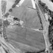 Oblique aerial view centred on the cropmarks of the SE of a Roman temporary camp with the western ditch and corner of Ravenswood temporary camp and linear cropmarks adjacent, taken from the SSE.