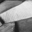 Oblique aerial view centred on the cropmarks of the settlement and enclosure, taken from the E.