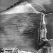 Oblique aerial view centred on the cropmarks of the fort, taken from the ENE.