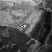 Gairmuir, depopulated settlement, trackways and cultivation remains: oblique air photograph under conditions of shadow
