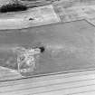 Oblique aerial view centred on the cropmarks of the settlement, taken from the NNW.