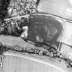 Preston Mill, oblique aerial view, taken from the SE, centred on cropmarks including a possible settlement. Preston Mill is visible in the centre of the photograph.