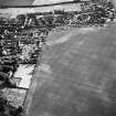 Oblique aerial view of cropmarks including linear croparks, taken from the NE.