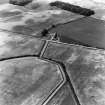 Waughton, settlements, enclosure and cropmarks: oblique air photograph.