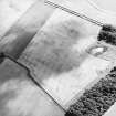 Oblique aerial view centred on the cropmarks of the settlements, taken from the NW.