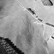 Aerial view of the route of the Wheel Causeway, centred on 6010 0861, and rig, taken from the SW.