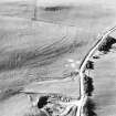 Aerial view of the route of the Wheel Causeway, centred on 6010 0861, and rig, taken from the SSE.