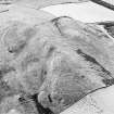 Oblique aerial view centred on the remains of the fort and rig, taken from the E.