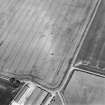 Oblique aerial view of Wester Broomhouse centred on the cropmark of a possible trackway, with the cropmark of a possible pit-alignment adjacent.  Taken from the SW.