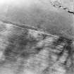 Oblique aerial view centred on the cropmarks of the possible settlement, taken from the NE.