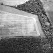 Whitekirk, oblique aerial view, taken from the WSW, centred on cropmarks of a settlement. Further cropmarks are visible in the centre left of the photograph.