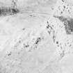 Woden Law, fort and associated monuments: air photograph under snow.
RCAHMS, 1992. (Also shows Dere Street).
