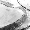 Morebattle, oblique aerial photograph, taken from the SE, centred on the cropmarks of a fort.