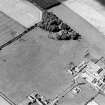Oblique aerial view of Redden centred on the remains of a grange with a farmsteading adjacent, taken from the E