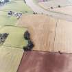 General oblique aerial view centred on the cropmarks of the settlement, taken from the NE.