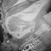 Oblique aerial view centred on the cropmarks of the settlement, the possible fort and possible causewayed enclosure, taken from the S.