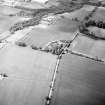 Oblique aerial view centred on the linear cropmarks, taken from the ESE.