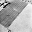 Oblique aerial view centred on the cropmarks of the settlement with coach house and stable adjacent, taken from the ESE.