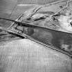 Dryburn Bridge, oblique aerial view, taken from the NE, centred on the cropmarks of a palisaded enclosure.