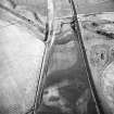 Dryburn Bridge, oblique aerial view, taken from the NW, centred on the cropmarks of a palisaded enclosure.