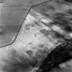 Oblique aerial view of Callander Place, taken from the NE, centred on cropmarks.