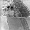 Oblique aerial view centred on the cropmarks of the settlements, taken from the WSW.