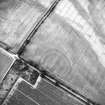 Oblique aerial view centred on the cropmarks of the settlement and enclosure, taken from the SSE.