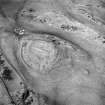 Oblique aerial view centred on the remains of the fort and settlement, taken from the S.