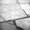 Oblique aerial view centred on the cropmarks of the pit-alignments and linear cropmarks with linear cropmarks adjacent, taken from the N.