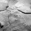 Oblique aerial view centred on the remains and cropmarks of the possible settlement, taken from the N.