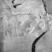 Oblique aerial view centred on the remains and cropmarks of the possible settlement, taken from the W.