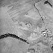 Oblique aerial view centred on the remains and cropmarks of the possible settlement, taken from the SSW.