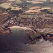 General colour oblique aerial view of the town (NW96SW 108) taken from the N with Eyemouth Fort (NT96SW 1) in the foreground.