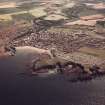 General colour oblique aerial view of the town (NT96SW 108) taken from the N with Eyemouth Fort (NT96SW 1) in the foreground.